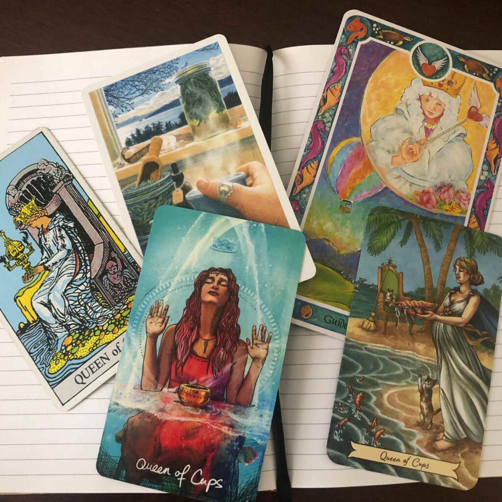 Queen of Cups from various decks. Rider Waite, Herbcrafters Tarot, Inner Child, The Light See's Tarot, and Every Witch Tarot